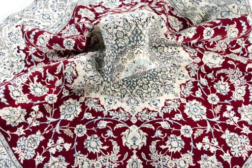 Surface texture of New Nain rug with natural Wool and intricate pattern