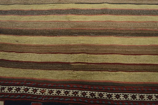 Backside of handmade 1930s Kilim Ghashghai rug showing knot structure and weave density