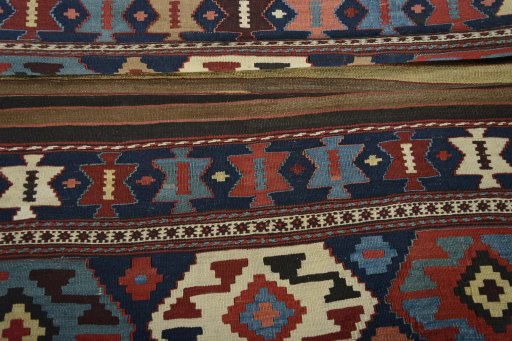 Full view of 1930s Kilim Ghashghai rug from Iran / Persia, 171 × 111 cm in Multi Color tones