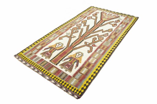 Corner detail of 2000s Kilim Ghashghai rug showing border pattern and Wool pile