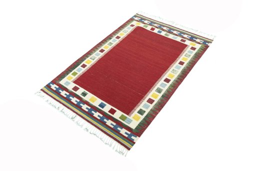 Corner detail of Unknown Kilim Ghashghai rug showing border pattern and Cotton pile