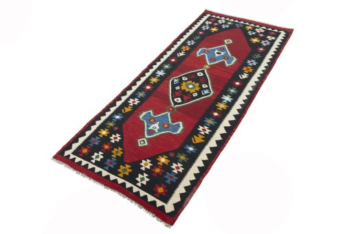 Corner detail of New Kilim Ghashghai rug showing border pattern and Wool pile