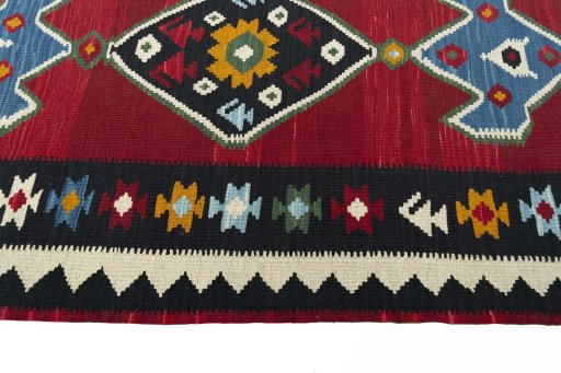 Close-up detail of New Kilim Ghashghai rug from Iran / Persia showing Wool weave