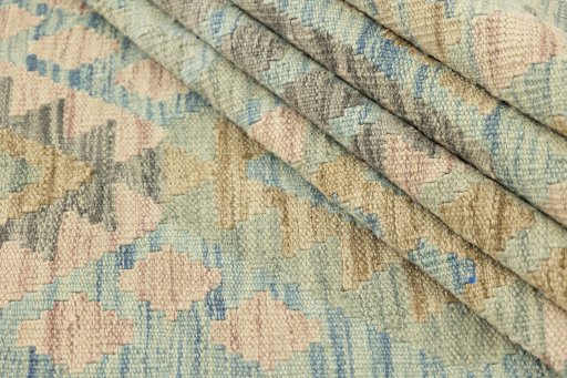 Close-up detail of New Kilim Traditional rug from Afghanistan showing Wool weave