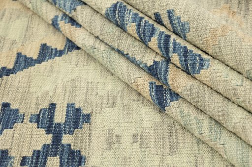 Close-up detail of New Kilim Traditional rug from Afghanistan showing Wool weave