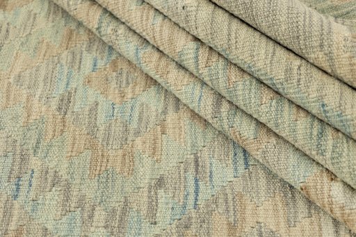 Close-up detail of New Kilim Traditional rug from Afghanistan showing Wool weave