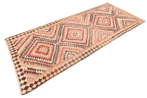 Close-up detail of 1989s Kilim Traditional rug from Iran / Persia showing Wool weave