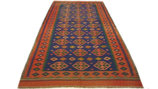 Close-up detail of New Kilim Traditional rug from Iran / Persia showing Wool weave