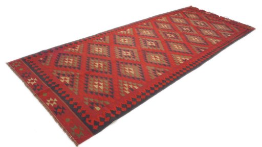 Close-up detail of New Kilim Traditional rug from Iran / Persia showing Wool weave