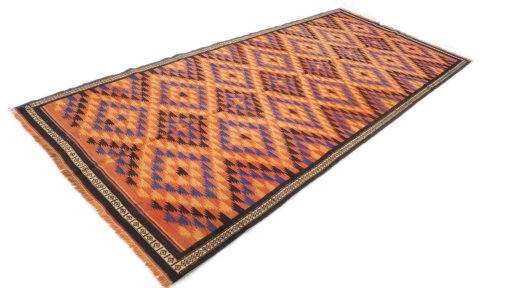 Close-up detail of New Kilim Traditional rug from Iran / Persia showing Wool weave