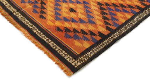 Backside of handmade New Kilim Traditional rug showing knot structure and weave density
