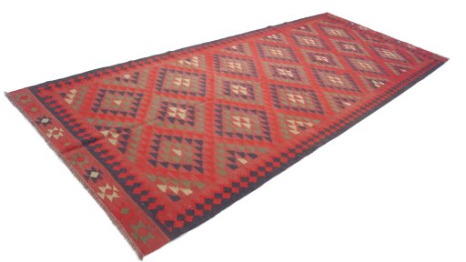 Close-up detail of New Kilim Traditional rug from Iran / Persia showing Wool weave