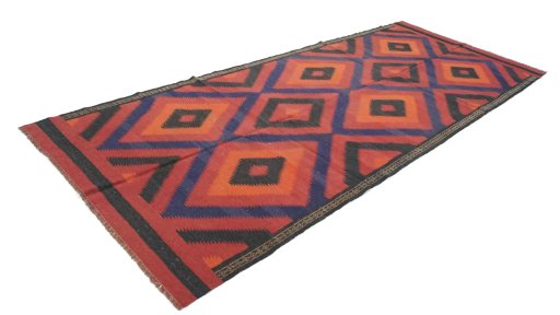 Close-up detail of New Kilim Traditional rug from Iran / Persia showing Wool weave