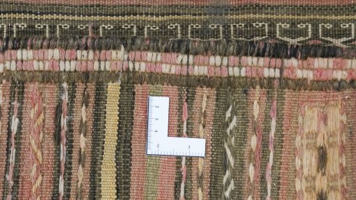 Corner detail of 1920s Kilim Traditional rug showing border pattern and Wool pile
