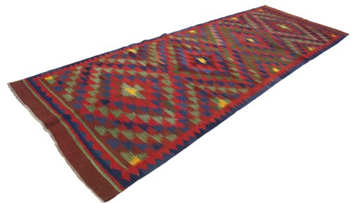 Close-up detail of New Kilim Traditional rug from Iran / Persia showing Wool weave
