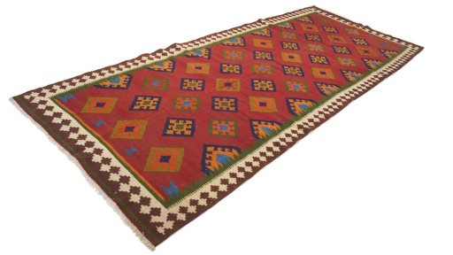 Close-up detail of New Kilim Traditional rug from Iran / Persia showing Wool weave