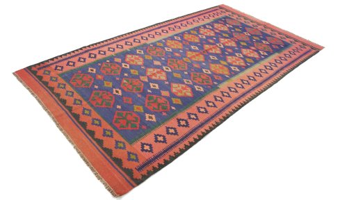Close-up detail of New Kilim Traditional rug from Iran / Persia showing Wool weave