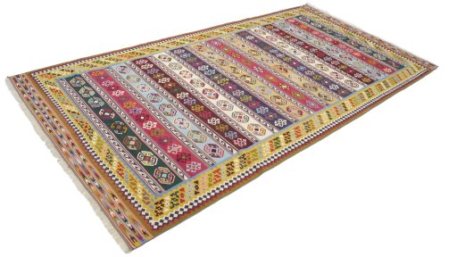 Close-up detail of New Kilim Traditional rug from Iran / Persia showing Wool weave