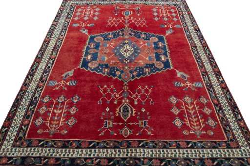 Surface texture of 2000s Sirjan rug with natural Wool and intricate pattern