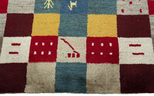 Central medallion detail of 2000s Persian Gabbeh rug from Pakistan
