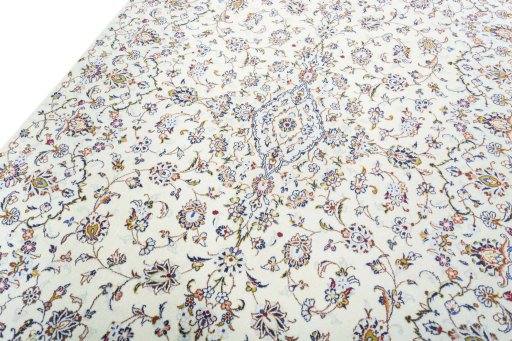 Backside of handmade New Kashan rug showing knot structure and weave density