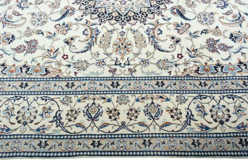 Corner detail of New Nain rug showing border pattern and Wool pile