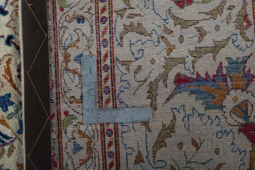 Surface texture of 1950s Kashan rug with natural Wool and intricate pattern