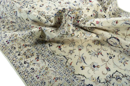 Surface texture of 2000s Kashan rug with natural Wool and intricate pattern
