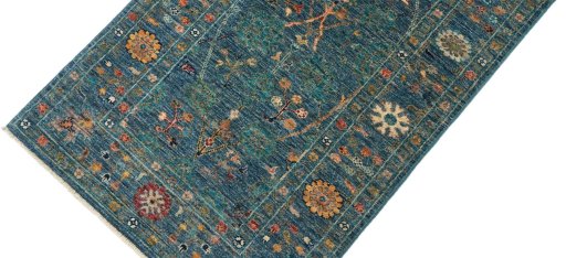 Backside of handmade New Farahan rug showing knot structure and weave density