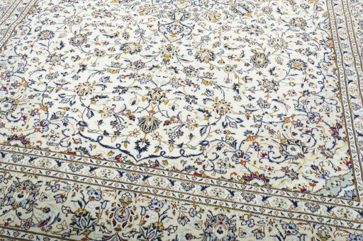 Close-up detail of 2000s Kashan rug from Iran / Persia showing Wool weave
