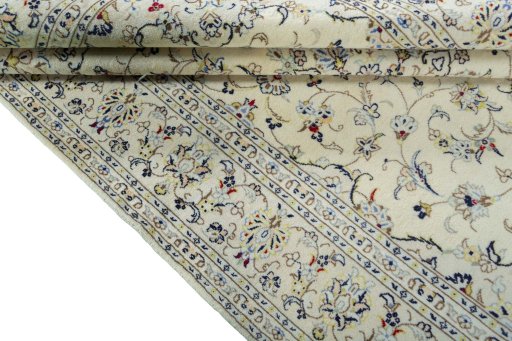 Close-up detail of 2000s Kashan rug from Iran / Persia showing Wool weave