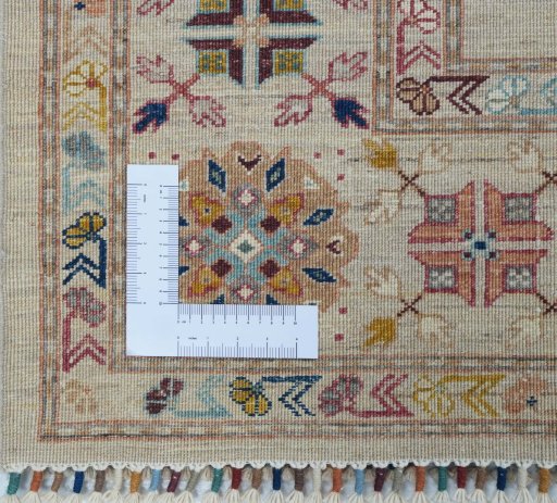 Corner detail of New Samarkand rug showing border pattern and Wool pile