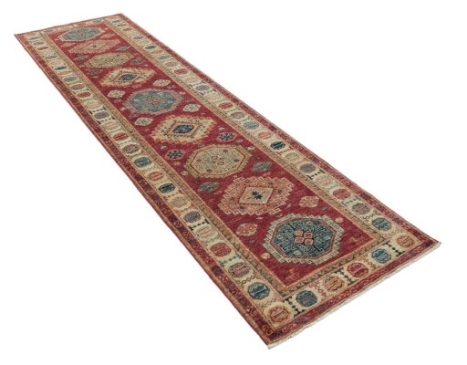 Corner detail of New Kazak rug showing border pattern and Wool pile