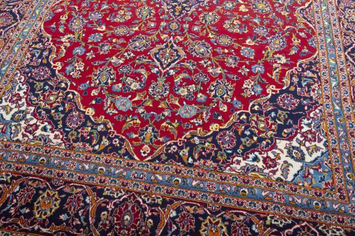 Close-up detail of 2000s Kashan rug from Iran / Persia showing Wool weave