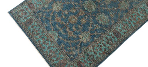 Backside of handmade New Farahan rug showing knot structure and weave density