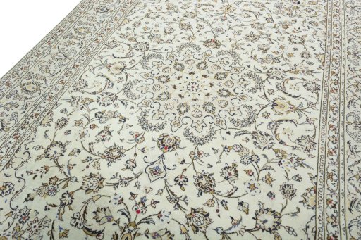 Backside of handmade 2000s Kashan rug showing knot structure and weave density