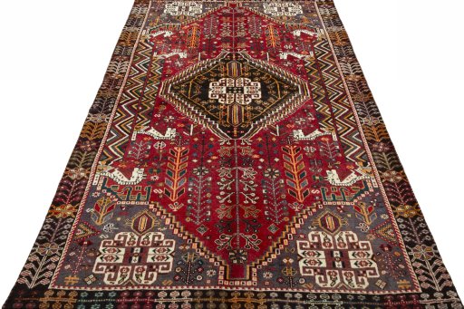 Surface texture of 2000s Shiraz rug with natural Wool and intricate pattern