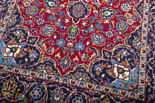 Close-up detail of 2000s Kashan rug from Iran / Persia showing Wool weave