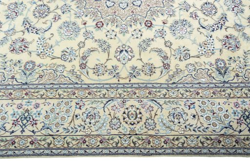 Corner detail of 2000s Nain rug showing border pattern and Wool pile