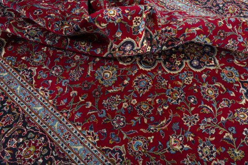 Surface texture of 2000s Kashan rug with natural Wool and intricate pattern