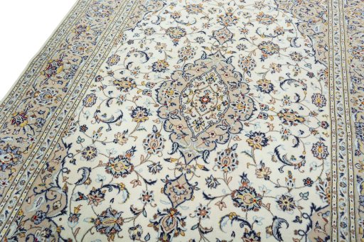 Backside of handmade 2000s Kashan rug showing knot structure and weave density