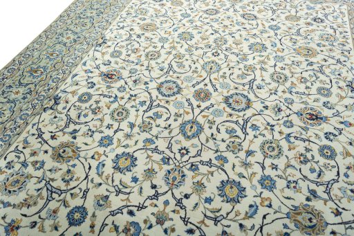 Backside of handmade 2000s Kashan rug showing knot structure and weave density