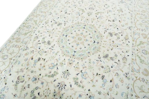 Backside of handmade New Kashan rug showing knot structure and weave density