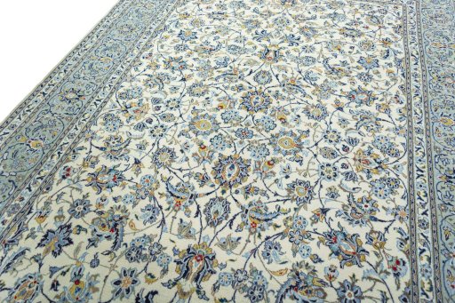 Backside of handmade 2000s Kashan rug showing knot structure and weave density