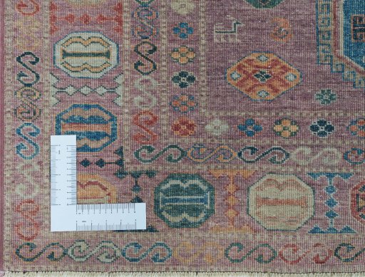 Corner detail of New Kazak rug showing border pattern and Wool pile