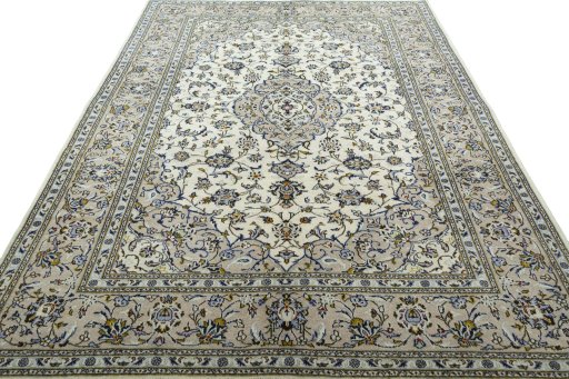 Surface texture of 2000s Kashan rug with natural Wool and intricate pattern
