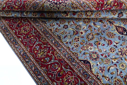 Close-up detail of 2000s Kashan rug from Iran / Persia showing Wool weave