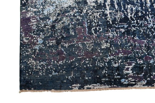 Backside of handmade New Mahli rug showing knot structure and weave density