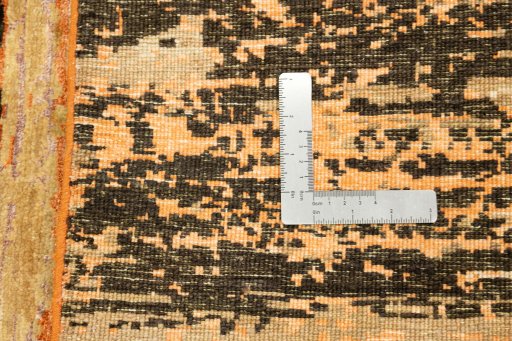 Backside of handmade New Mahli rug showing knot structure and weave density