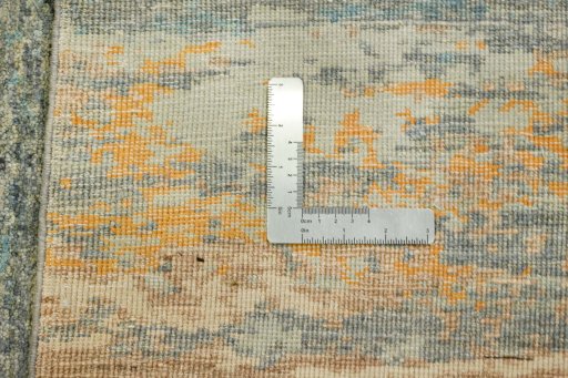 Backside of handmade New Mahli rug showing knot structure and weave density